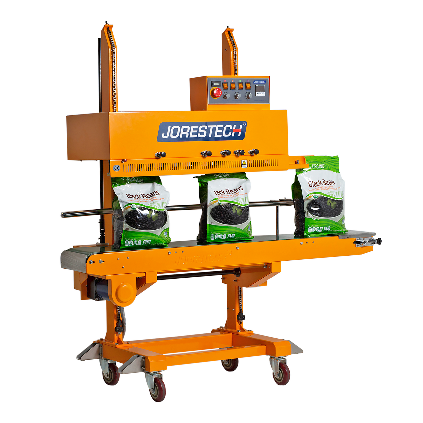 Yellow JORES TECHNOLOGIES® vertical continuous band sealer with coder sealing a production of large plastic bags filled with black beans