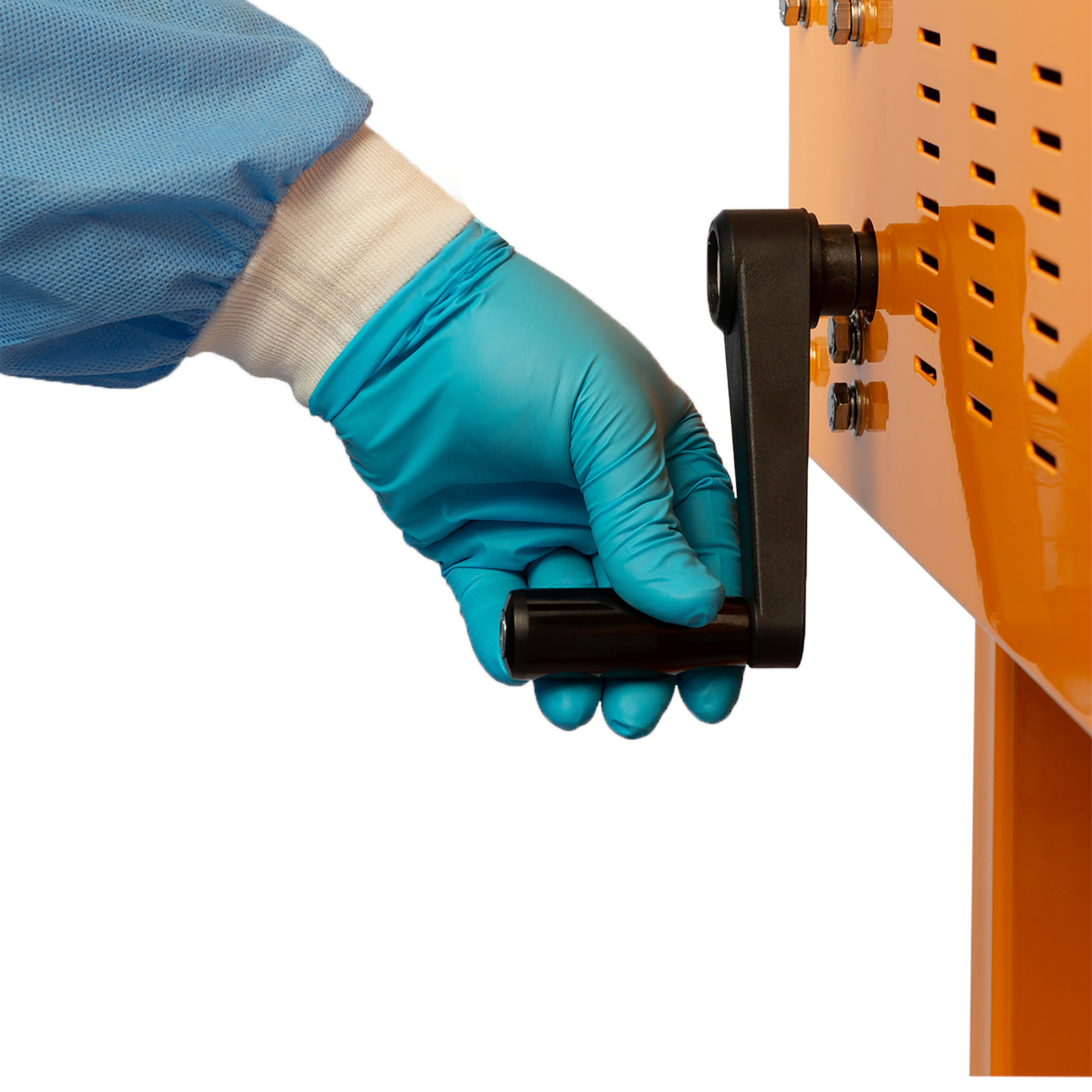 Operator wearing blue gloves adjusting the height of the sealing machine with the black removable handle before starting production
