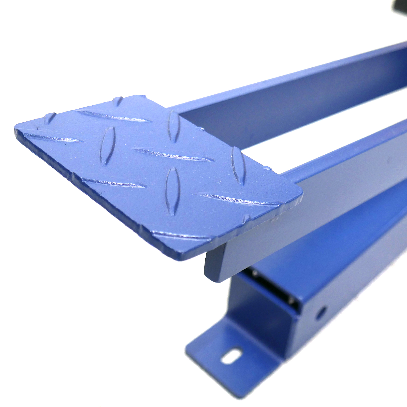 Close-up of the pedal on a bottom stapling machine