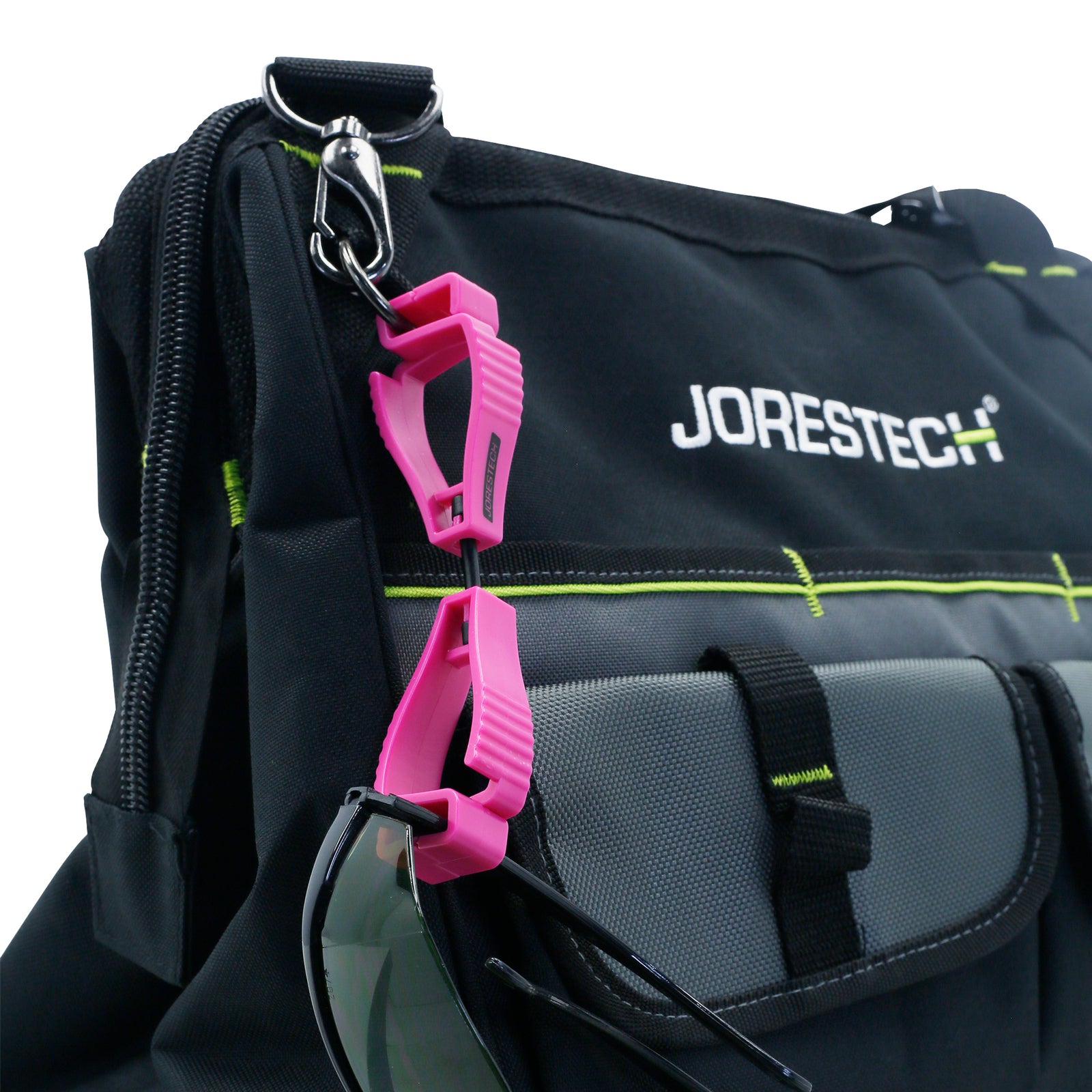 A pink JORESTECH glove clip safety holder attached to a black and gray tool bag