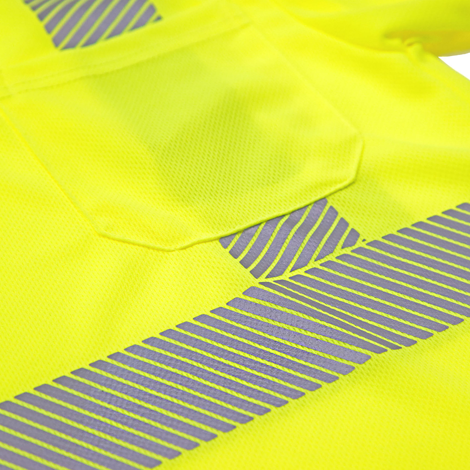 Close up of the pocket, heat transferred strip on the hi vis safety shirt with bird eye breathable fabric