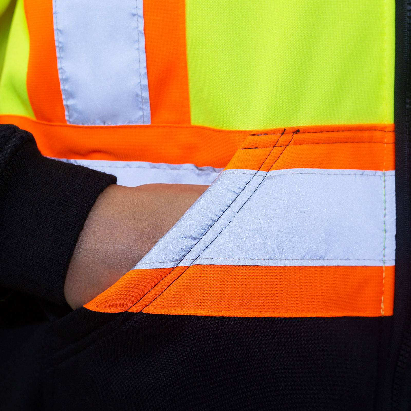 ANSI and CSA compliant hi vis yellow safety fleece sweater with back bottom dirt concealing fabric and pockets