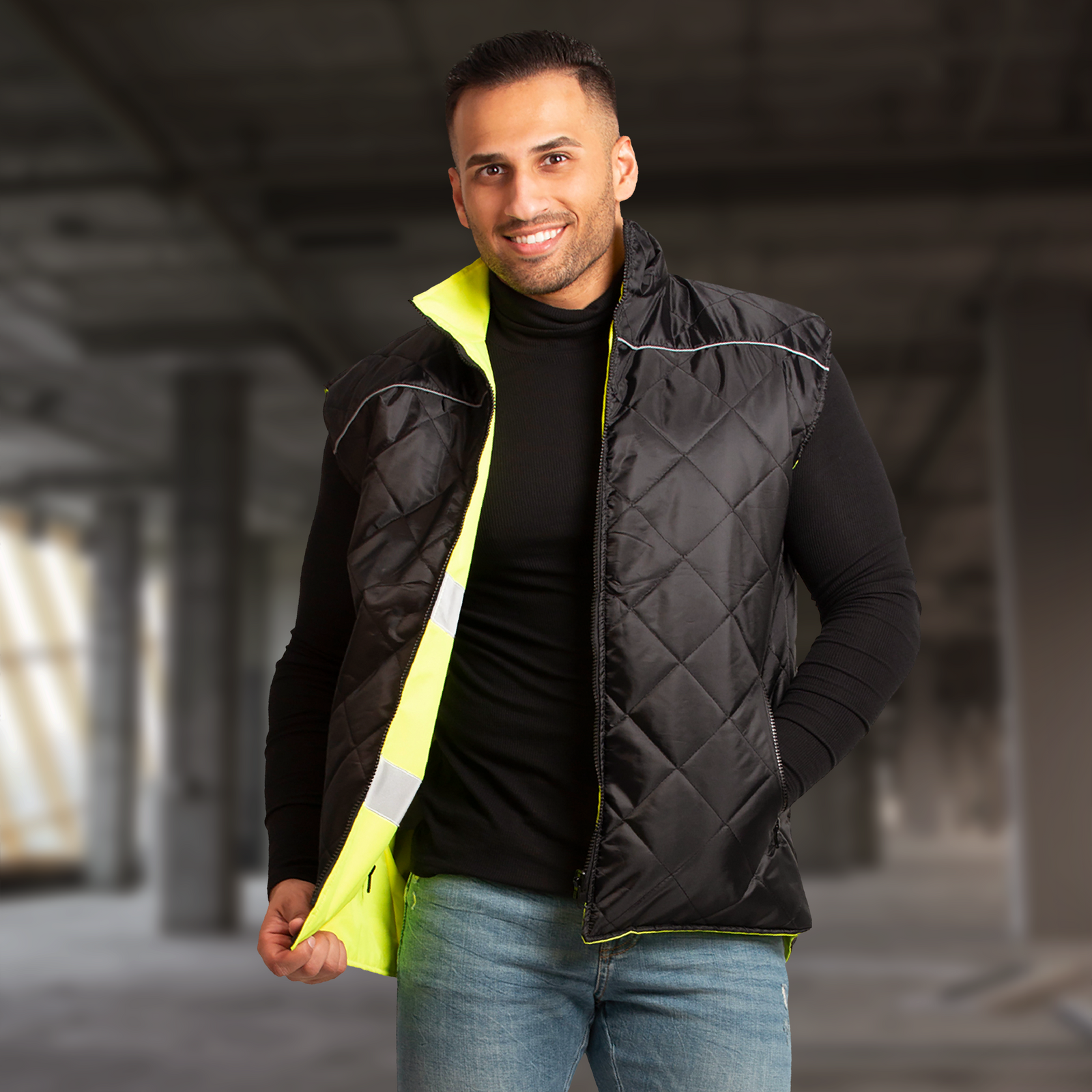 A man wearing the high visibility JORESTECH reversible safe vest  with the back side out.