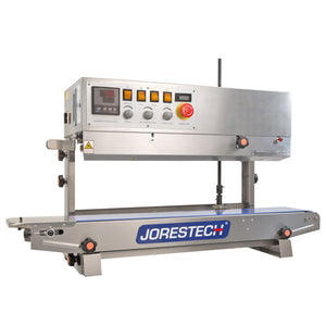 stainless steel JORESTECH left to right continuous band sealer with blue JORESTECH logo and red stop button  