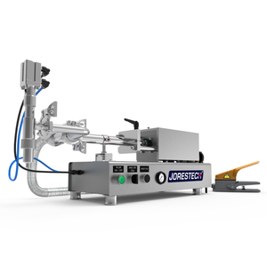  Low viscosity Jorestech piston filling machine in a diagonal view over white background. The piston filler is made out of stainless steel and there's a yellow and grey foot pedal resting on the side.