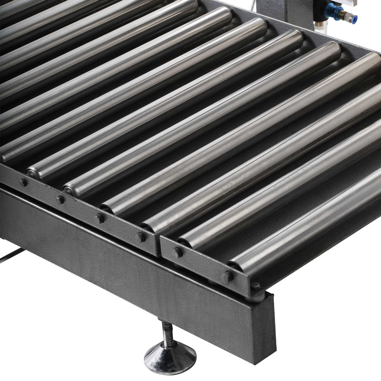 Closeup of the stainless steel rollers of the heavy duty conveyor and the height adjustable feet of the liquid net weight filler