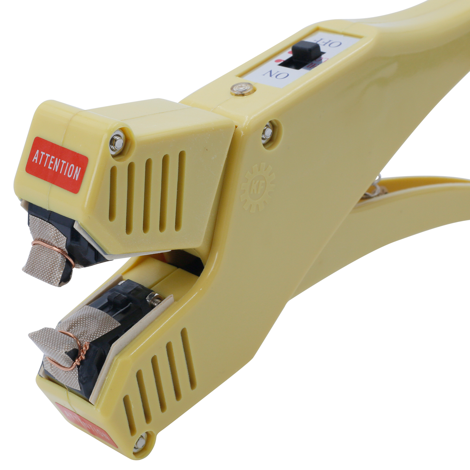 Close-up showing the heating element on the manual heat clam shell sealer and the red label with the instruction of 