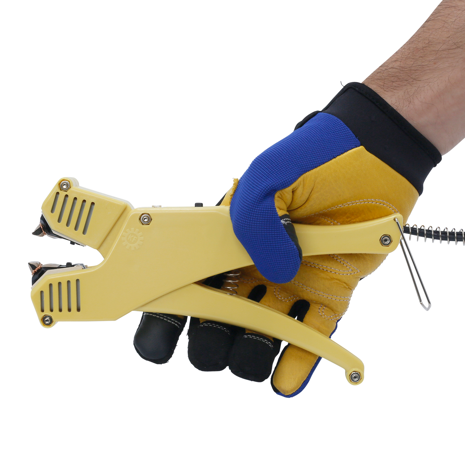 operator wearing blue and yellow gloves holding yellow manual direct heat clamshell sealer 