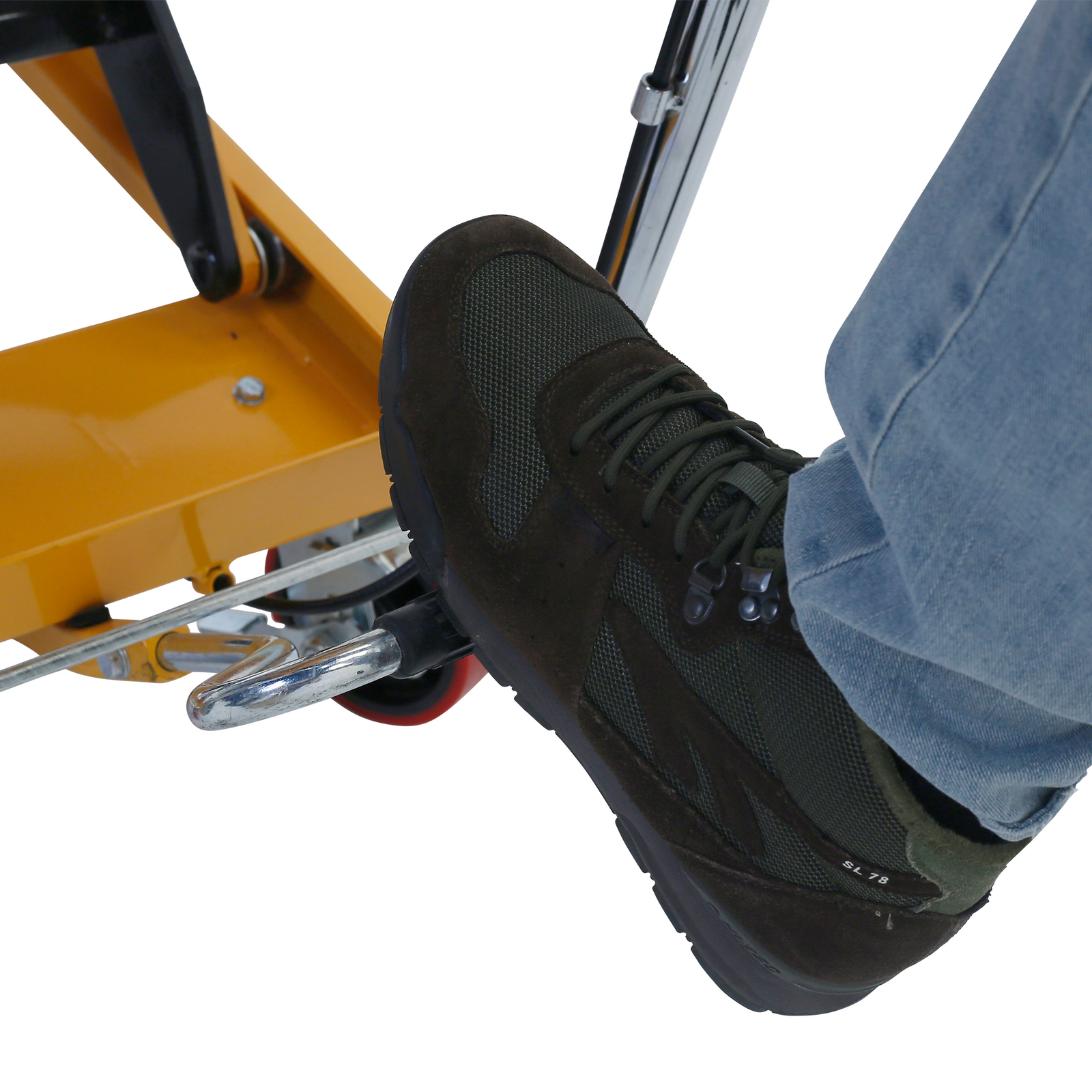 close up of a person wearing working shoes operating the foot pedal of the mobile table lift  to increase the height of the JORES TECHNOLOGIES® hydraulic lift table for 1100 pounds