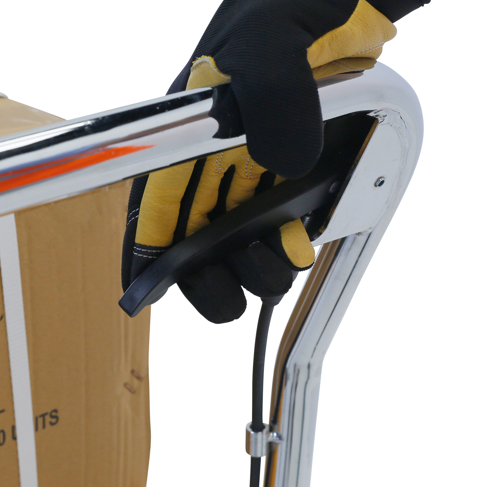 The hand of a person wearing mechanical gloves is pressing the handle activator to lower the table lift of the JORES TECHNOLOGIES® scissor lift table