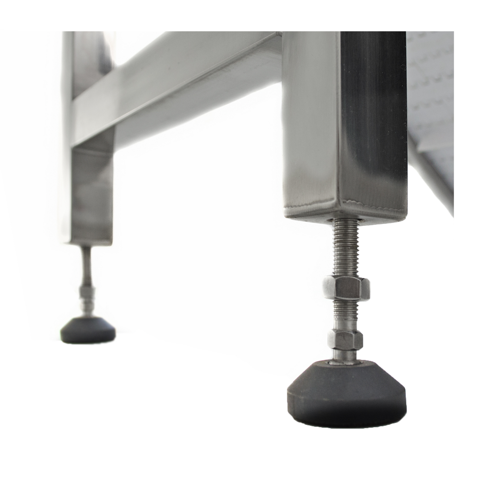 close up of black height adjustable legs on stainless steel motorized conveyor 
