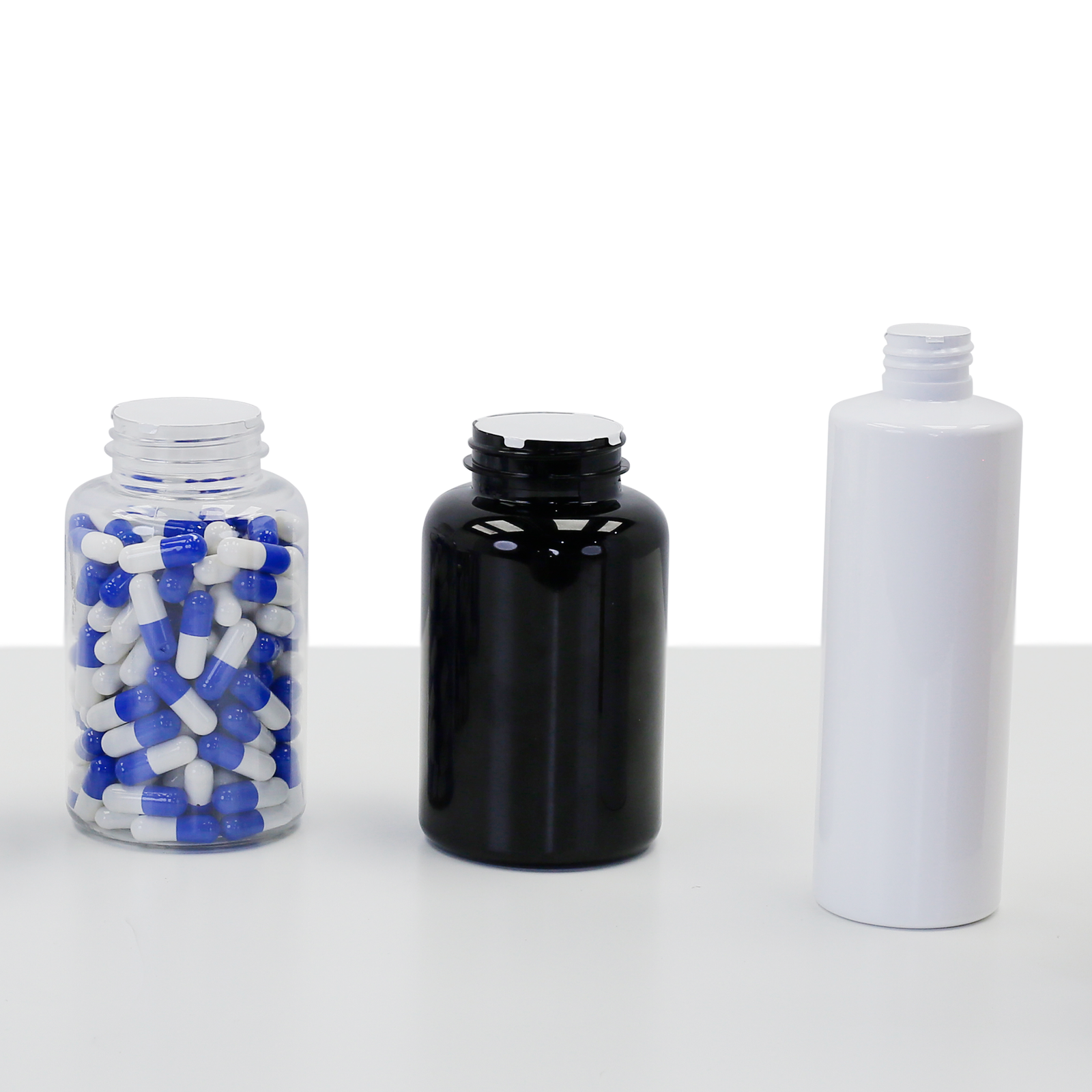 A collection of containers of different sized which have been sealed with induction liners using the Jorestech electromagnetic cap sealer