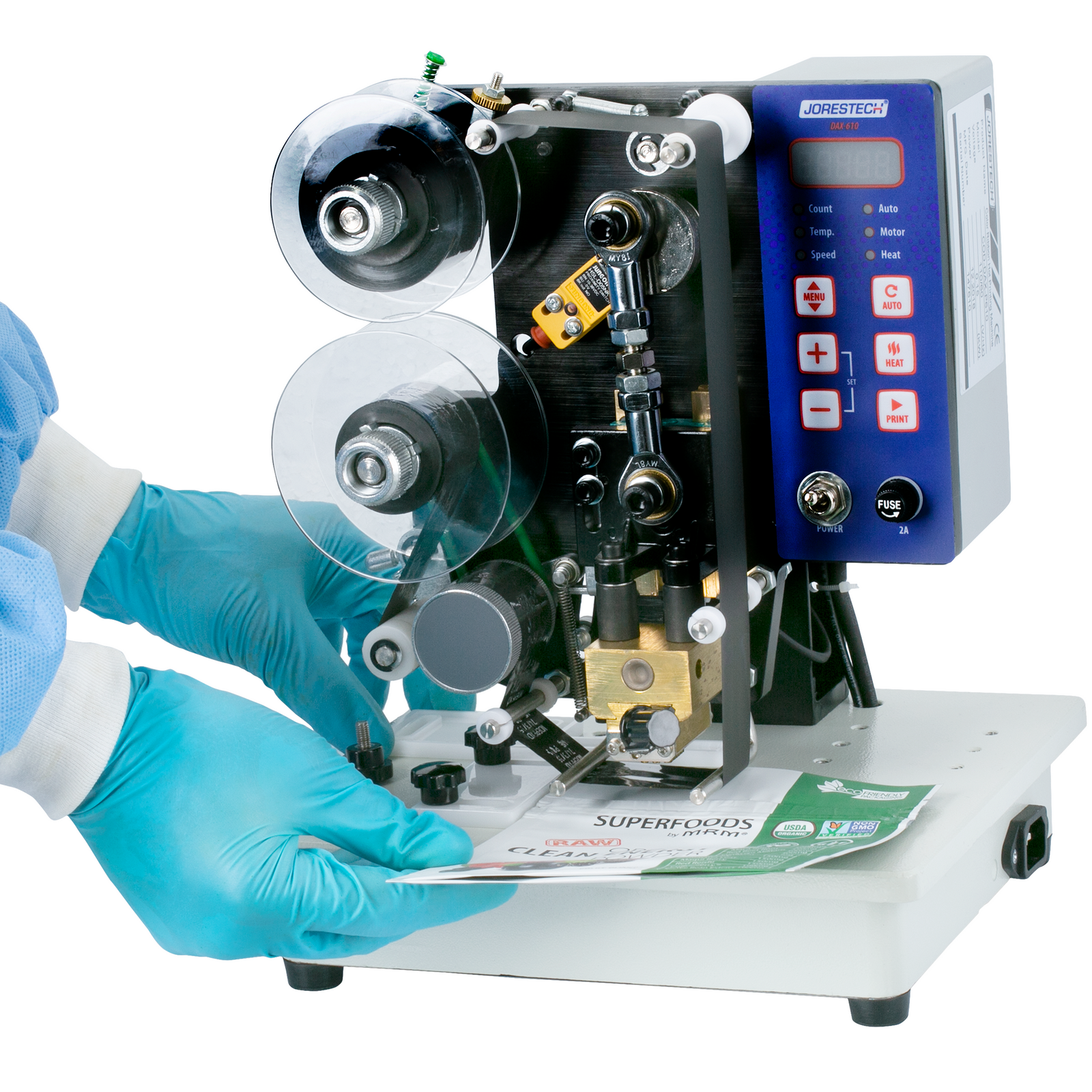 Close up of a person placing a bag so that it is printed by the DAX semi automatic digital hot stamping printer