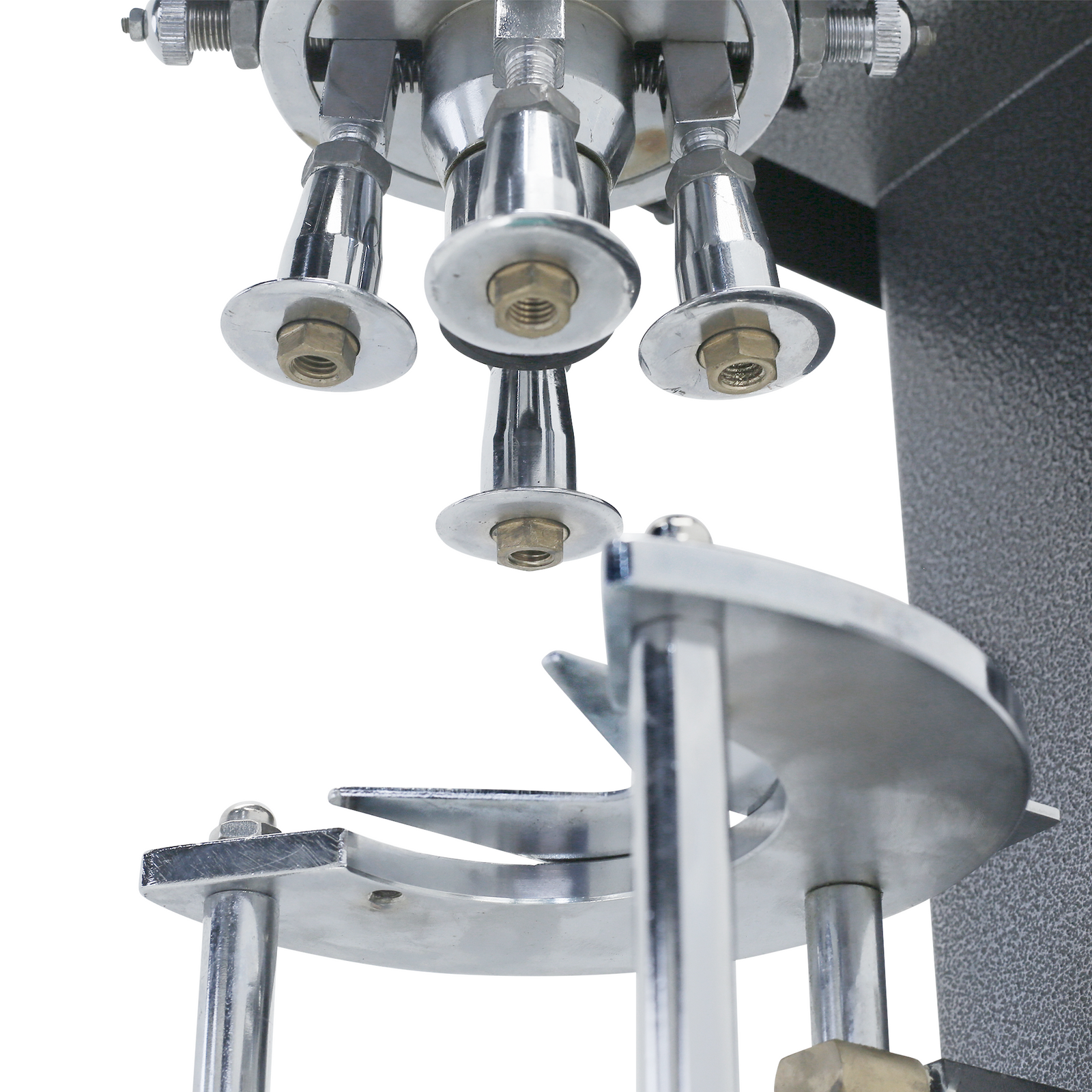 close up of capping components on grey rugged metal construction JORES TECHNOLOGIES® semi-automatic bottle capper