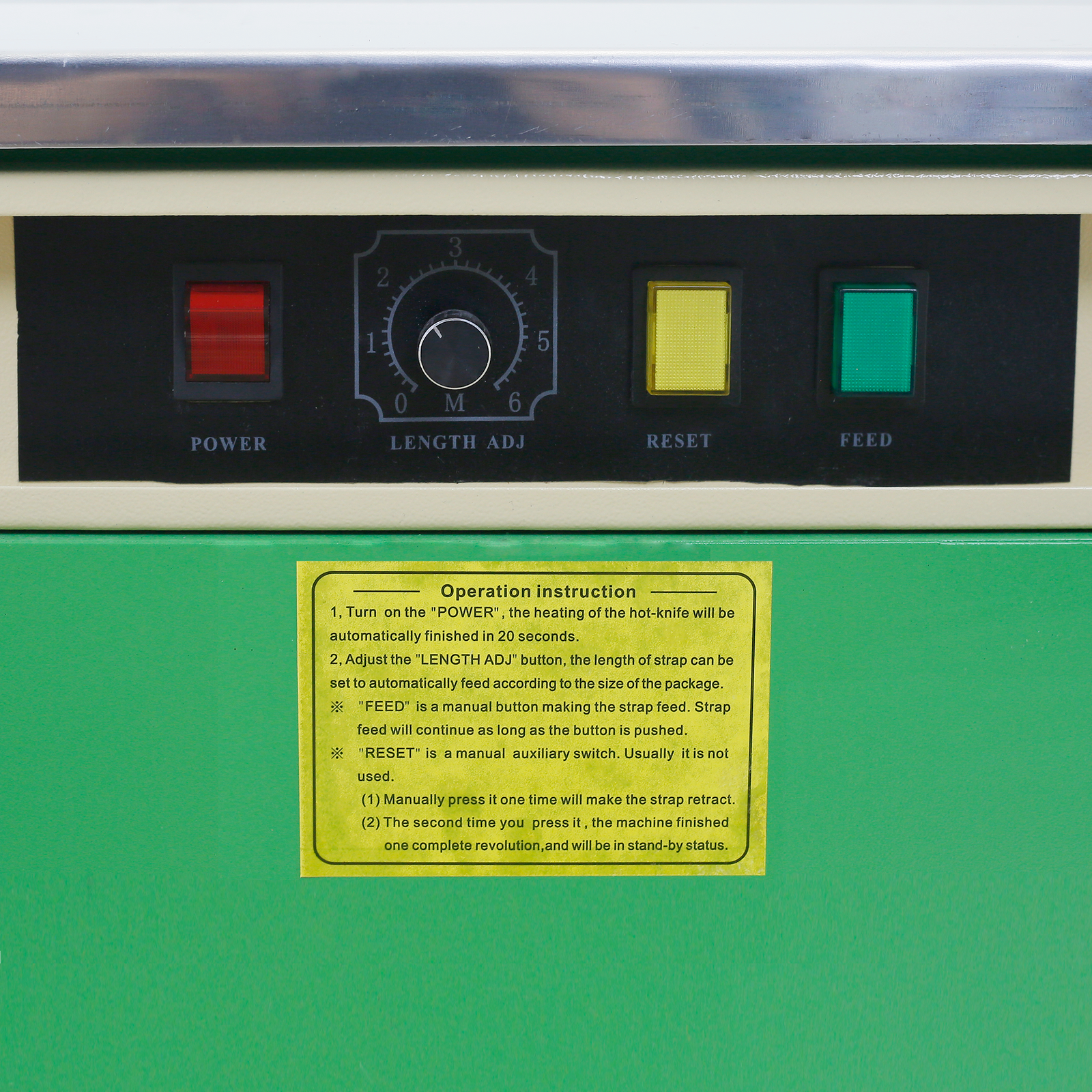 Control buttons and operator instructions on a JORES TECHNOLOGIES® semi automatic strapping packaging machine