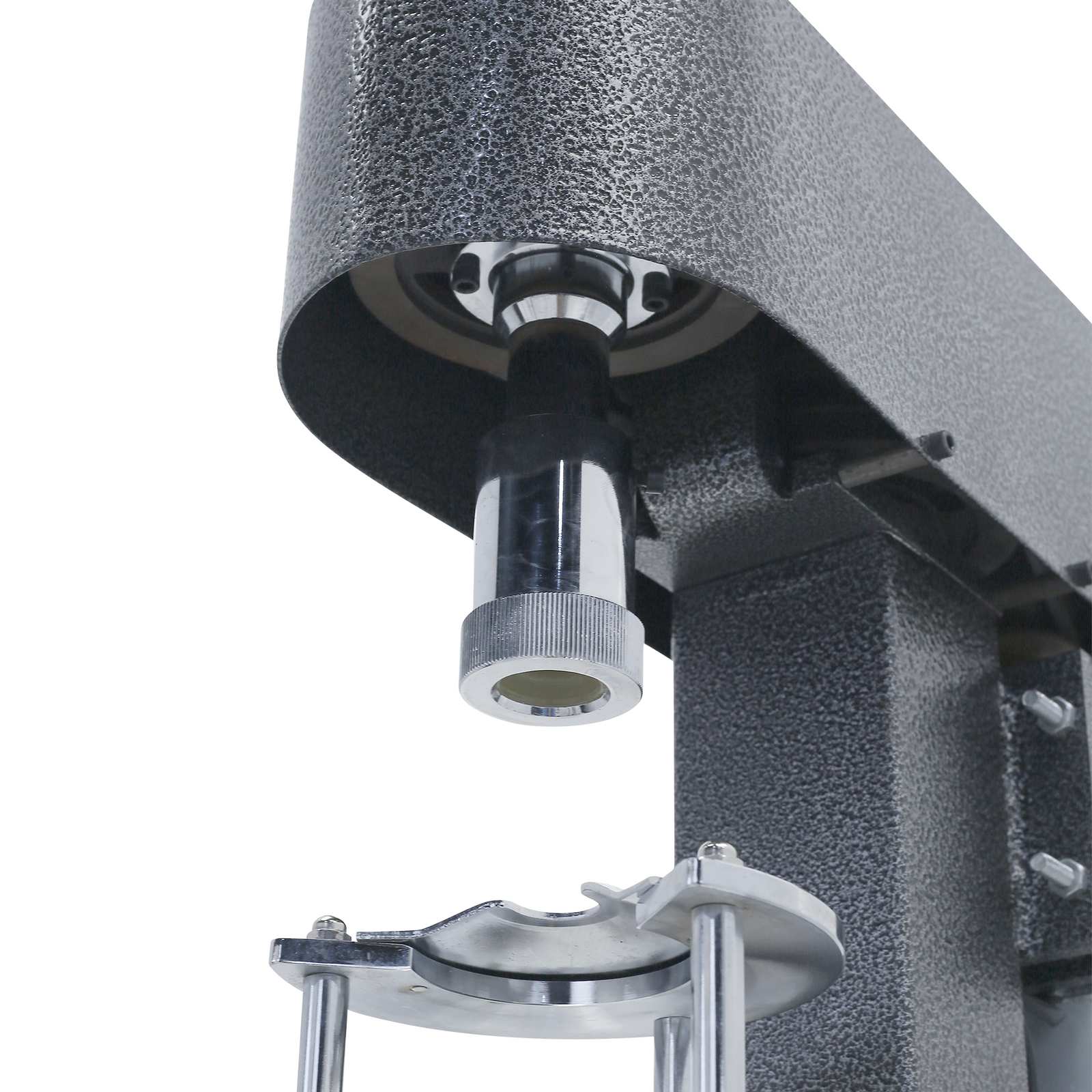 close up of capping component on grey bottle capper