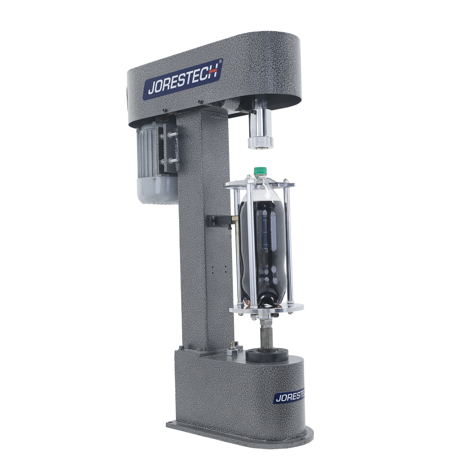 The bottle capper with Jorestech logo on side. The machine has a plastic bottle filled with dark liquid and has a plastic green cap closing the bottle.