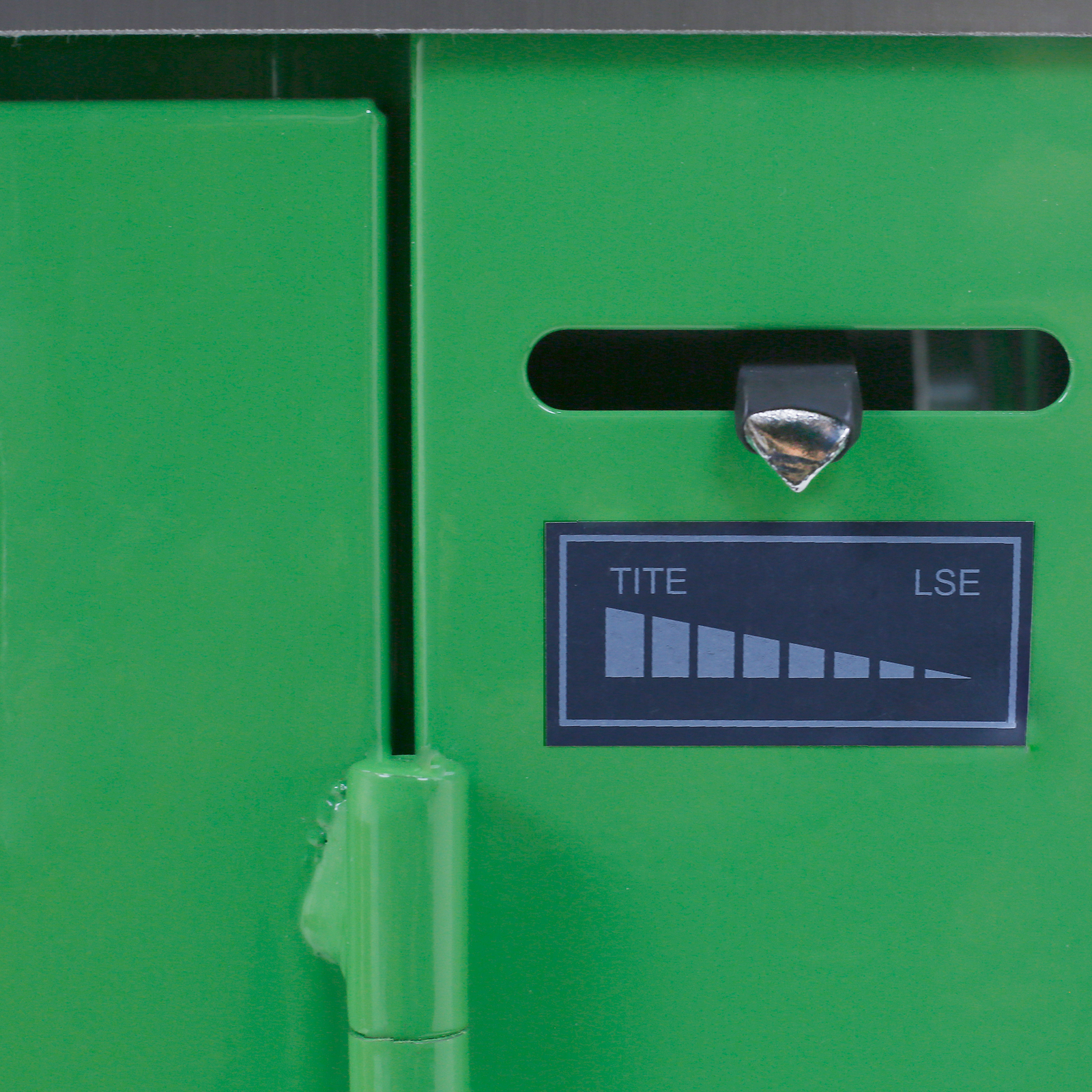 Close-up of an adjustable feature on a JORES TECHNOLOGIES®  strapping machine for polypropylene bands