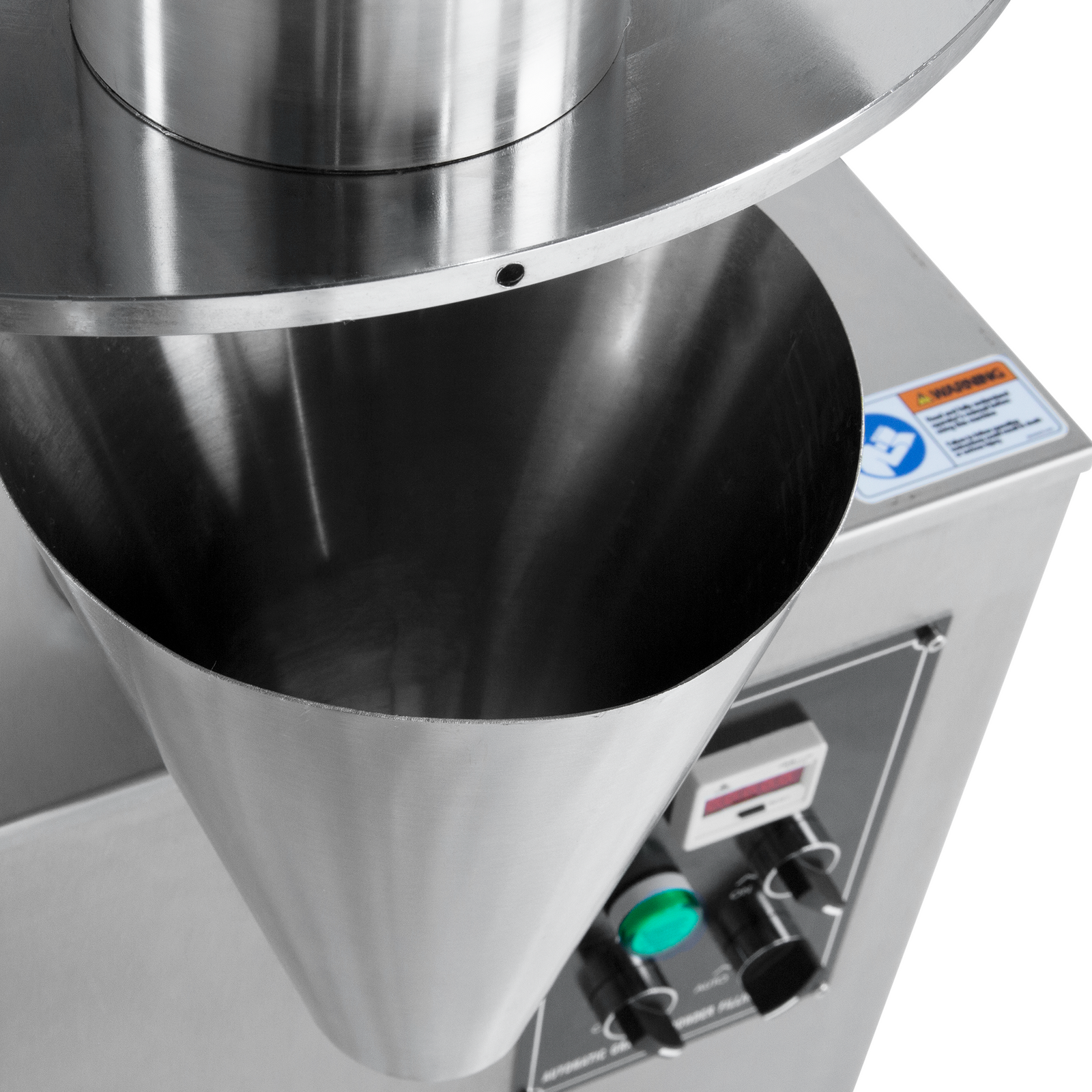 closeup of the dispensing cone of the JORES TECHNOLOGIES®  semi automatic volumetric filler