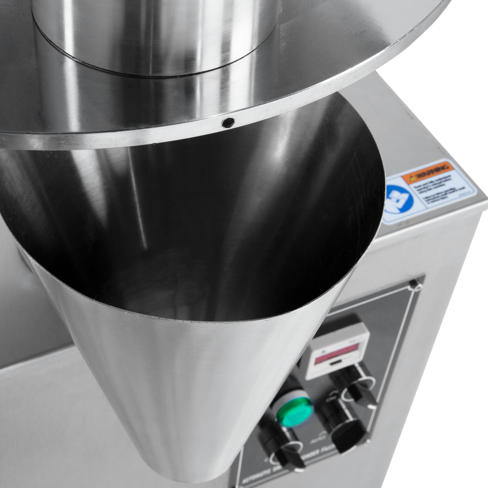 closeup of the dispensing cone of the JORES TECHNOLOGIES® semi automatic volumetric filler