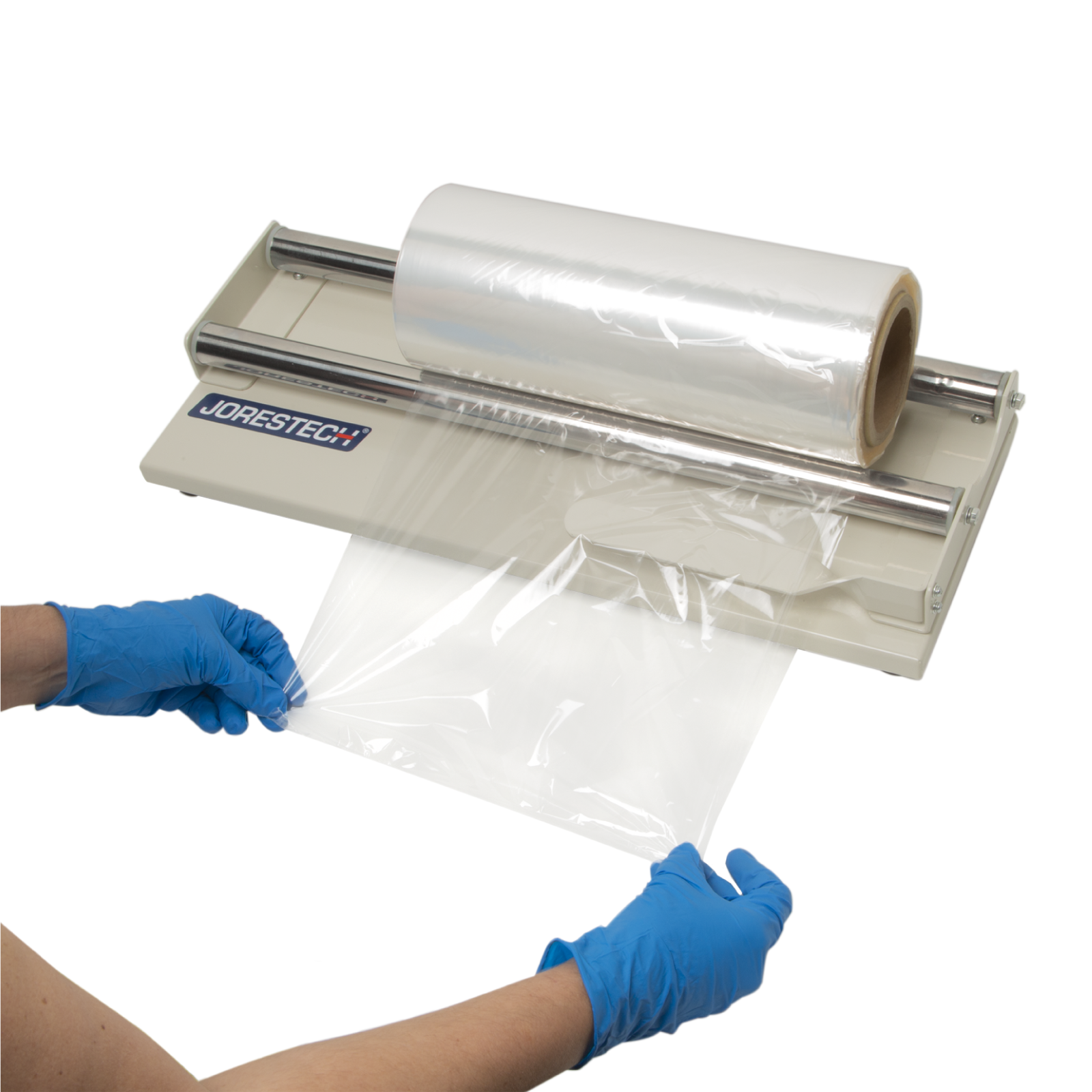 A operator using the shrink wrap dispenser 