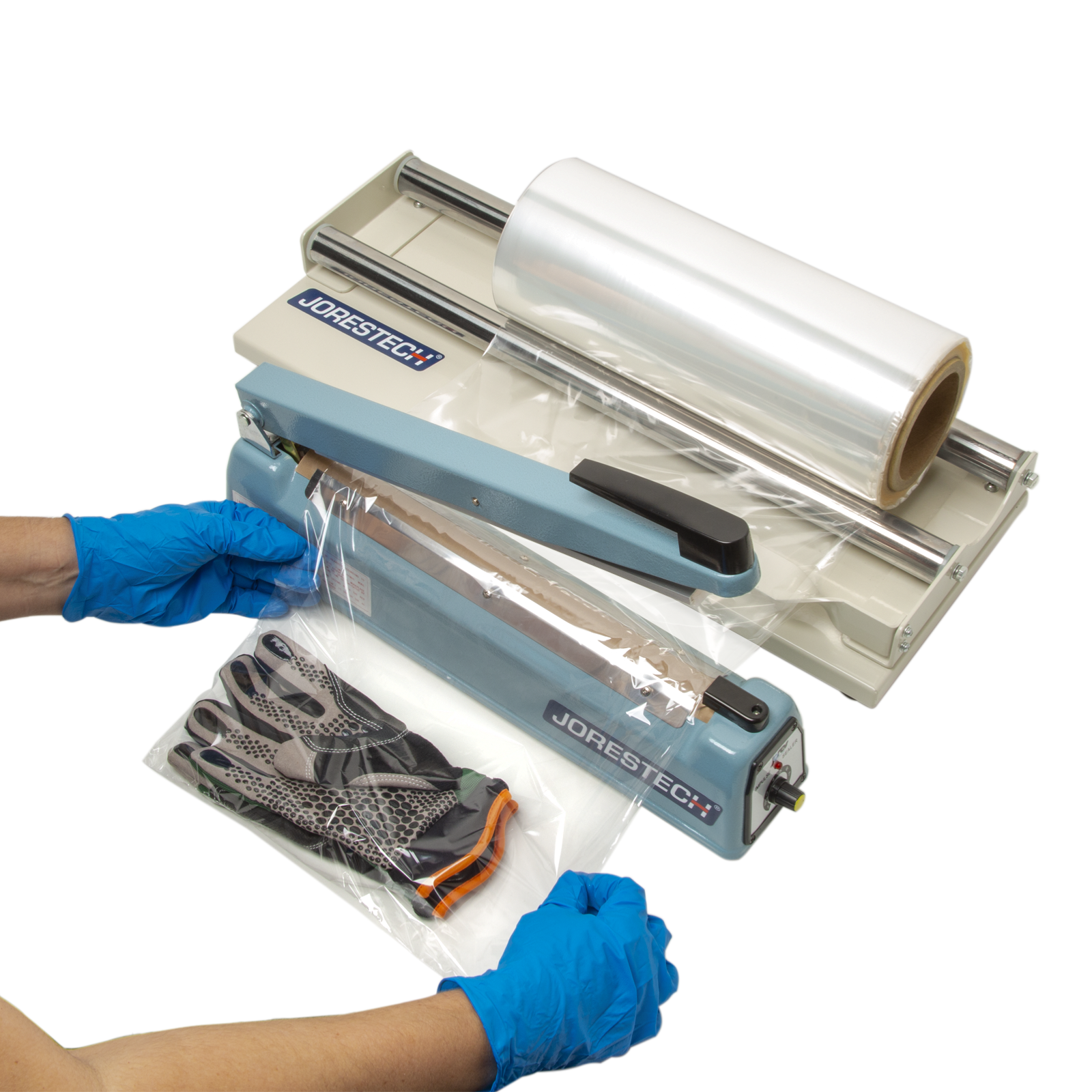 Person using the shrink wrap dispenser and a manual impulse sealer to make a bag to pack a pair of gloves