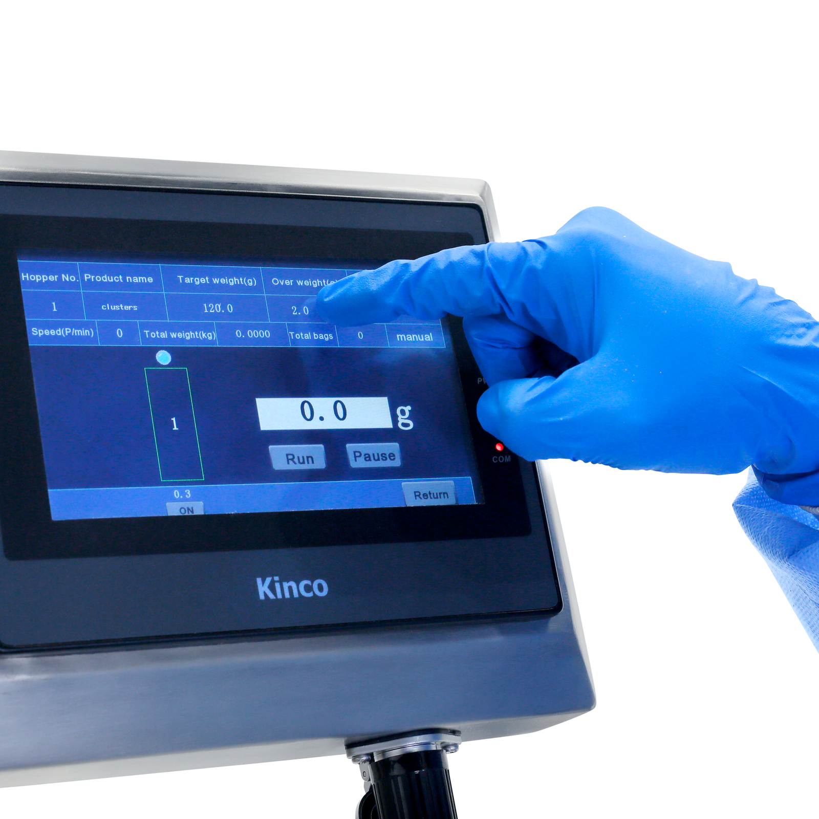 Operator wearing a blue glove using the touch screen on a JORESTECH linear weigher to program the machine. 