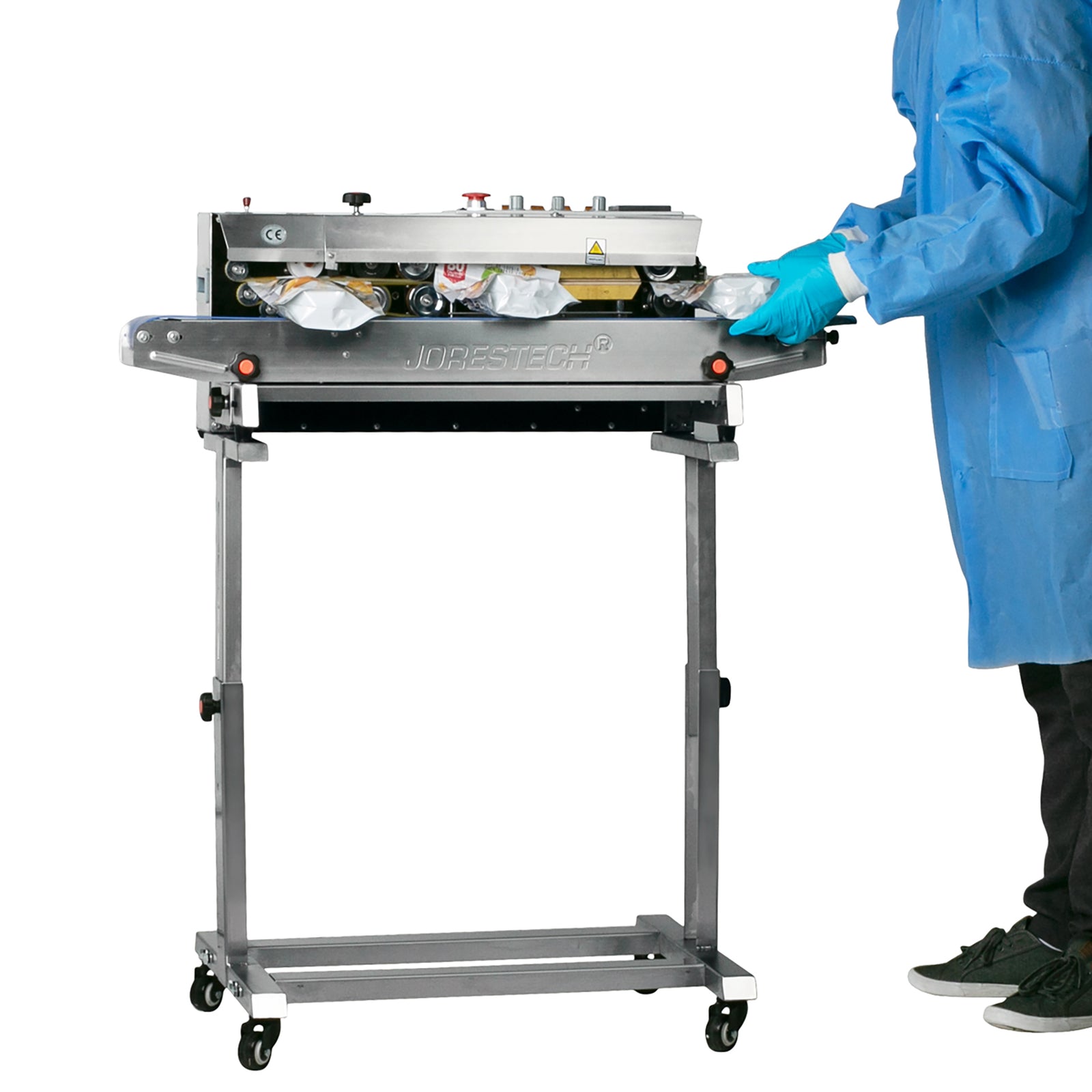 Continuous band sealer plced on top of the stainless steel stand compatible with this sealer
