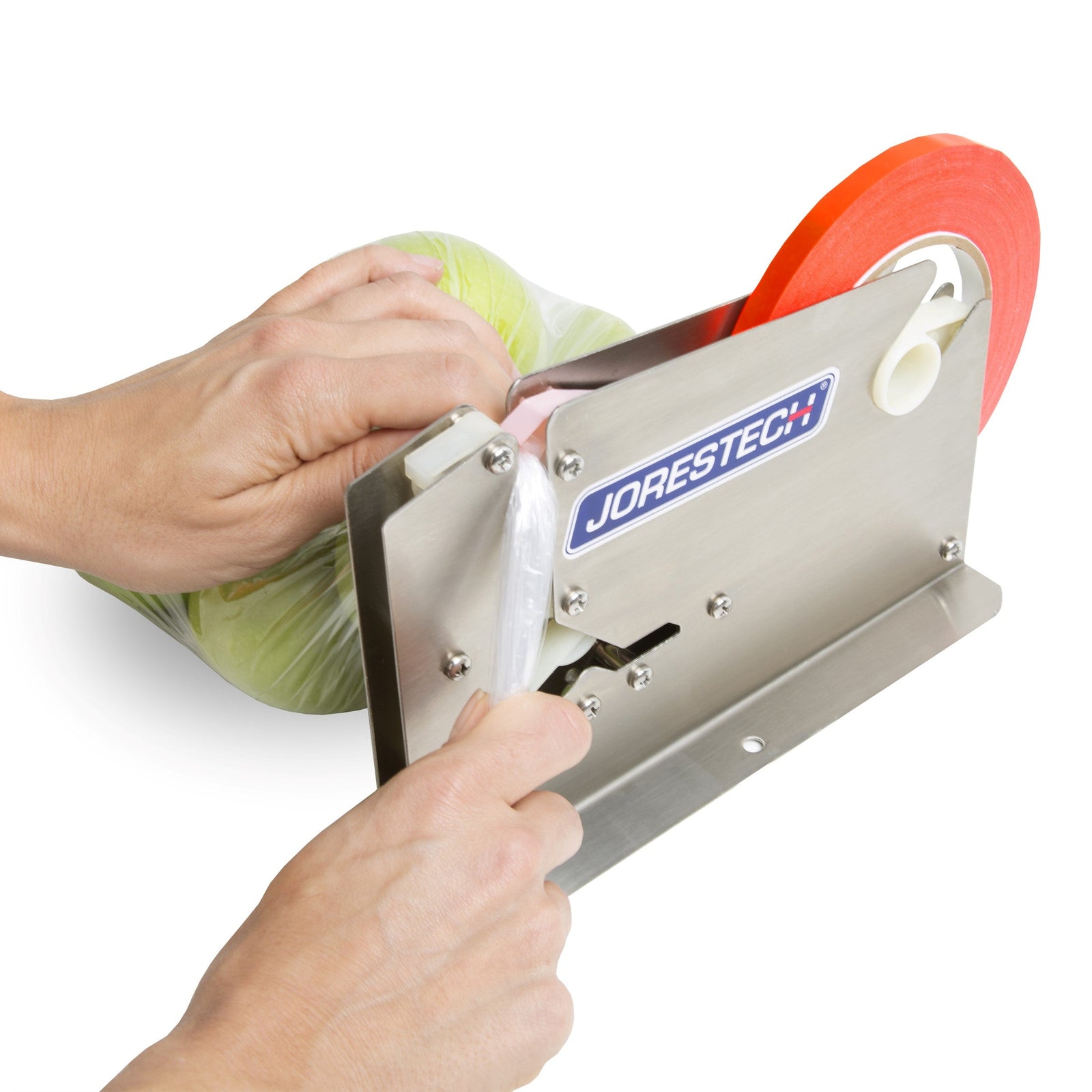 Operator inserting a plastic bag neck into the JORES TECHNOLOGIES® manual bag taper