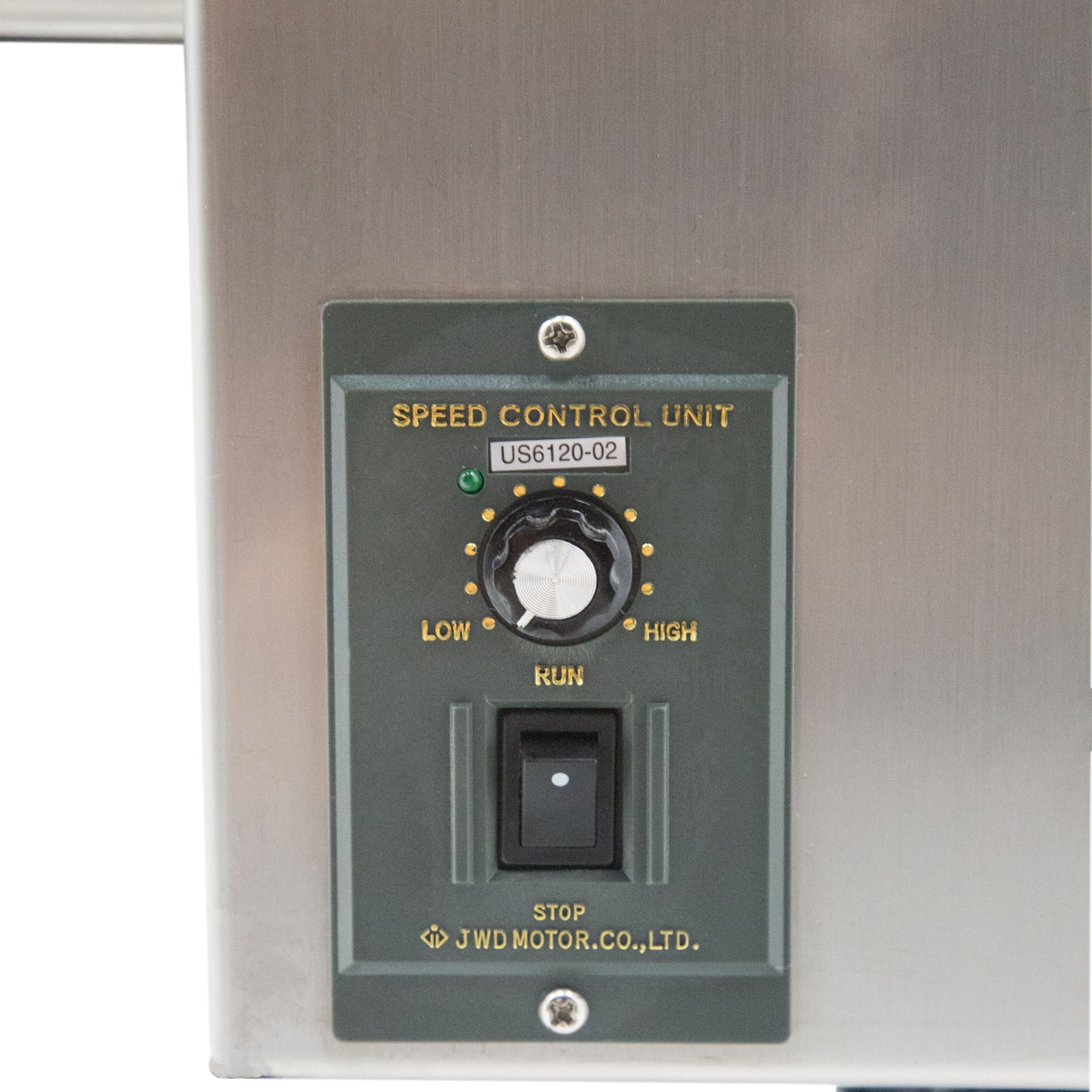 grey speed control unit with yellow text and white and black adjusting knobs