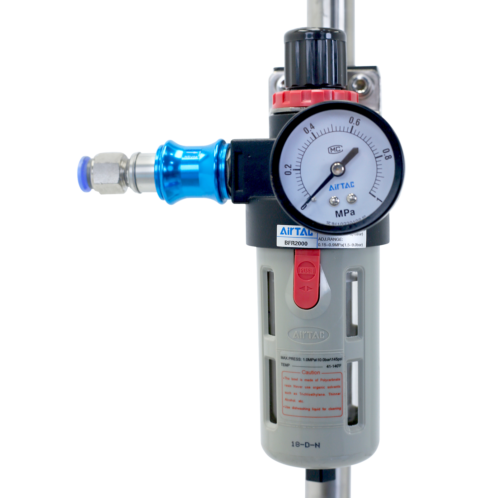 close up of black gauge on stainless steel tripod