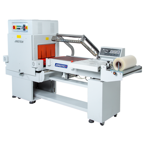 Diagonal view of a semi automatic L sealer and shrink tunnel combo with a shrink film roll installed on its roll dispenser