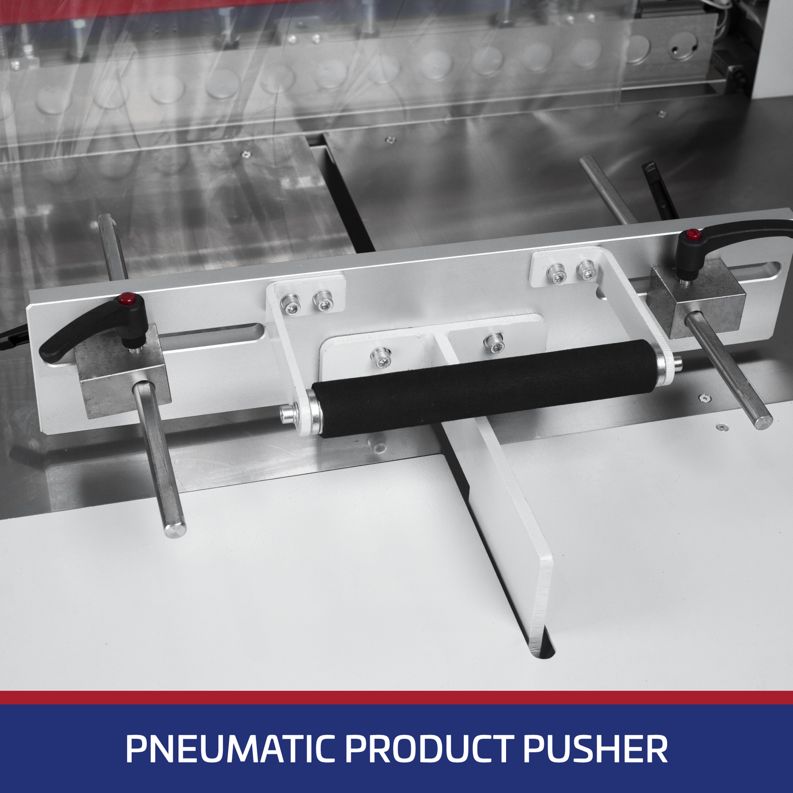 Close-up of the pneumatic product pusher