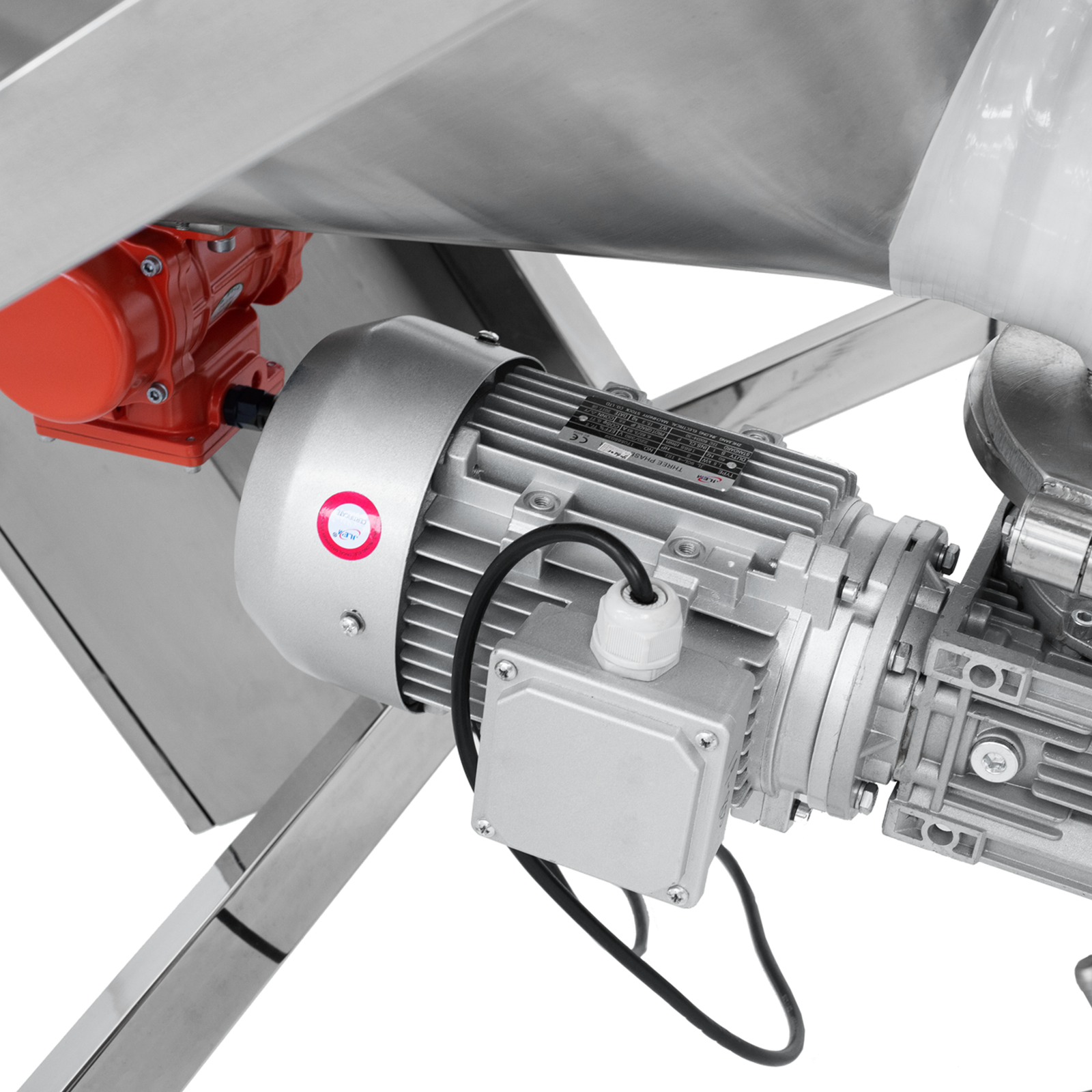 Close up detail shot of the motor on an auger screw conveyor and elevator for bulk powders.