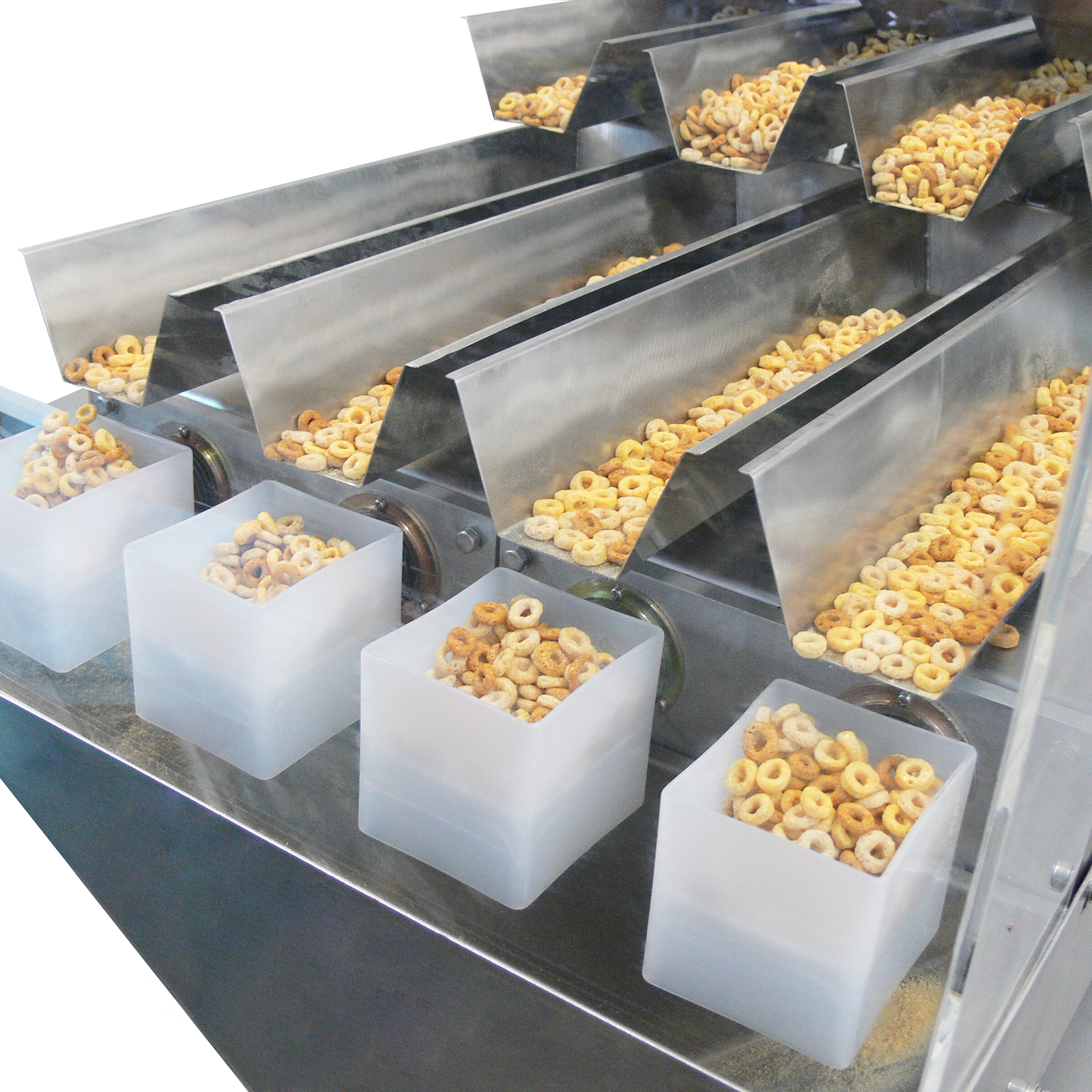 Close up of a JORES TECHNOLOGIES® four head linear weigher measuring and dispensing o-shaped cereal