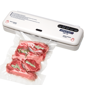  table top vacuum sealer over a white background. The sealer is packaging an embossed vacuum bag full of red meat and rosemary