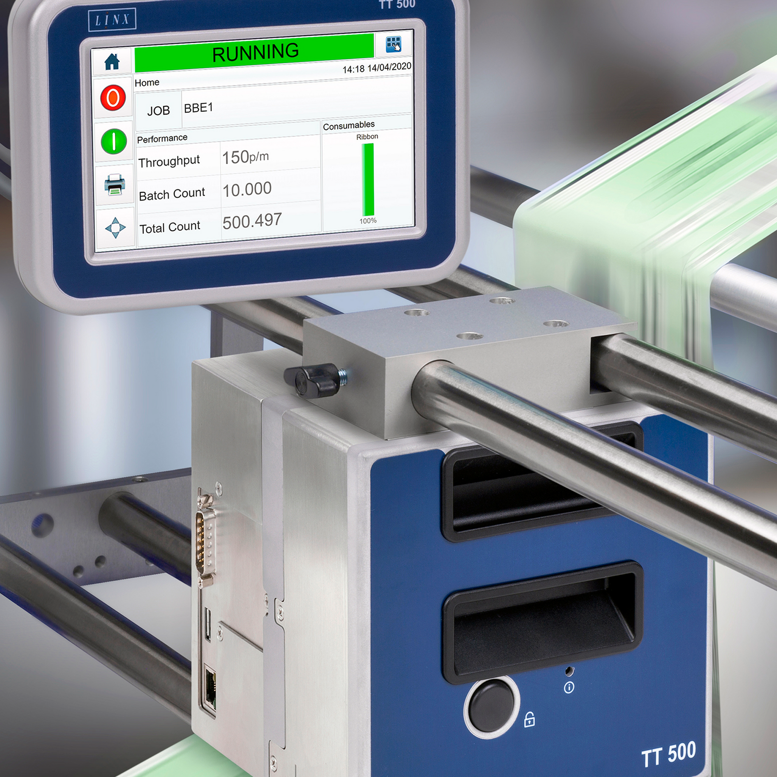 The thermal transfer over printer for narrow format LINX TT500 printer installed in a bracket printing on a moving film