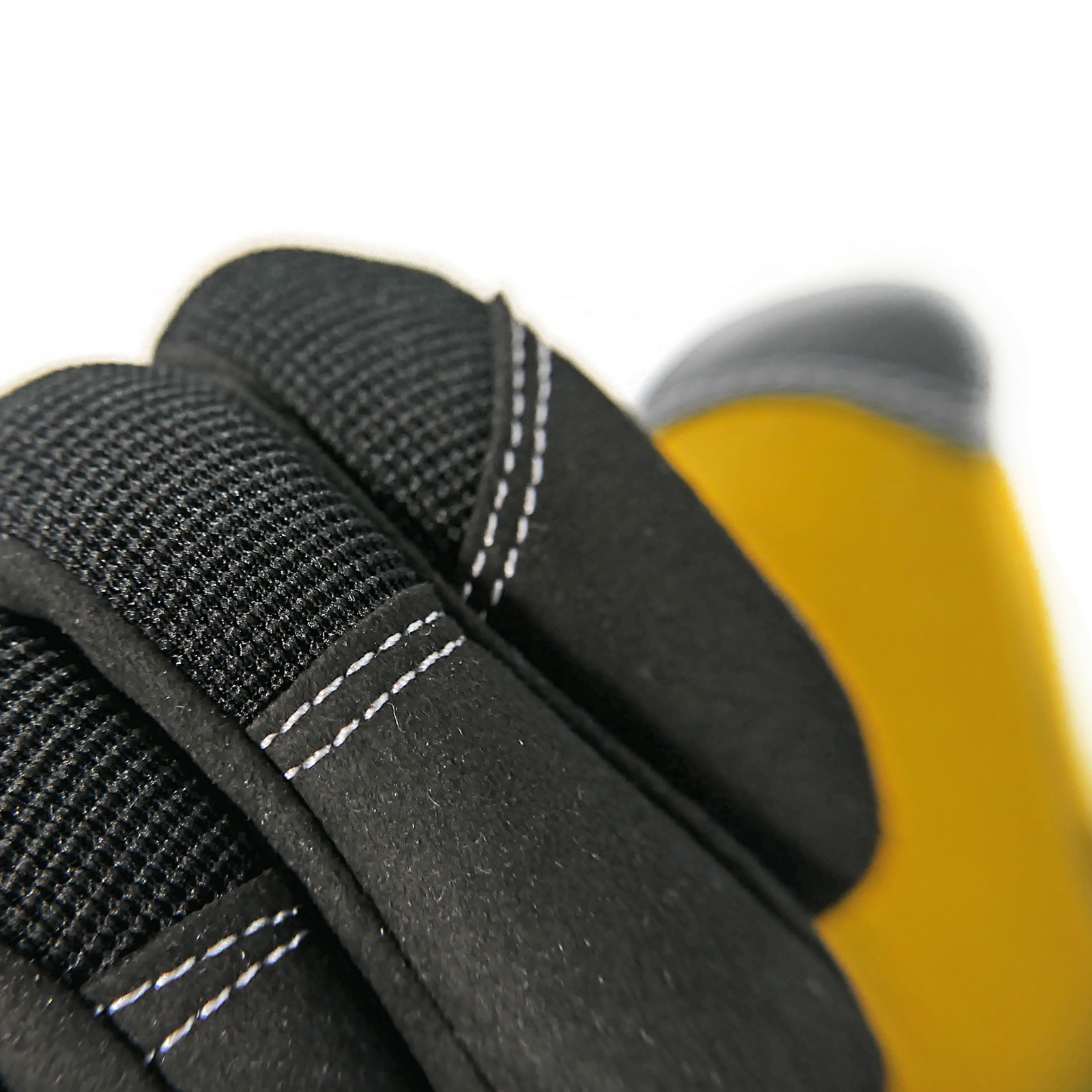 Black reinforced tips of the JORESTECH safety work glove with leather palms