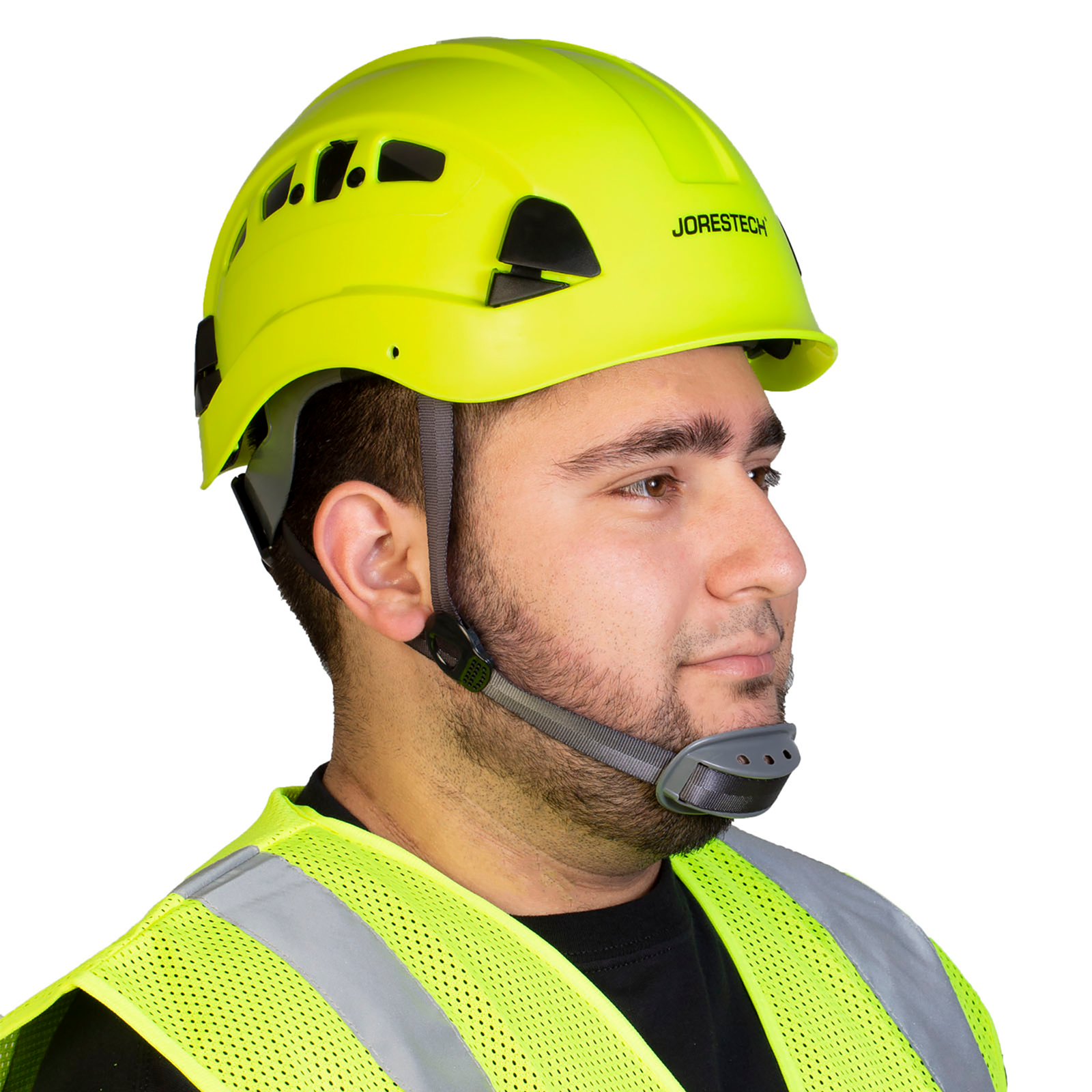 A person wearing the Jorestech lime ventilated rescue hard hat with adjustable 6 point suspension and chin strap