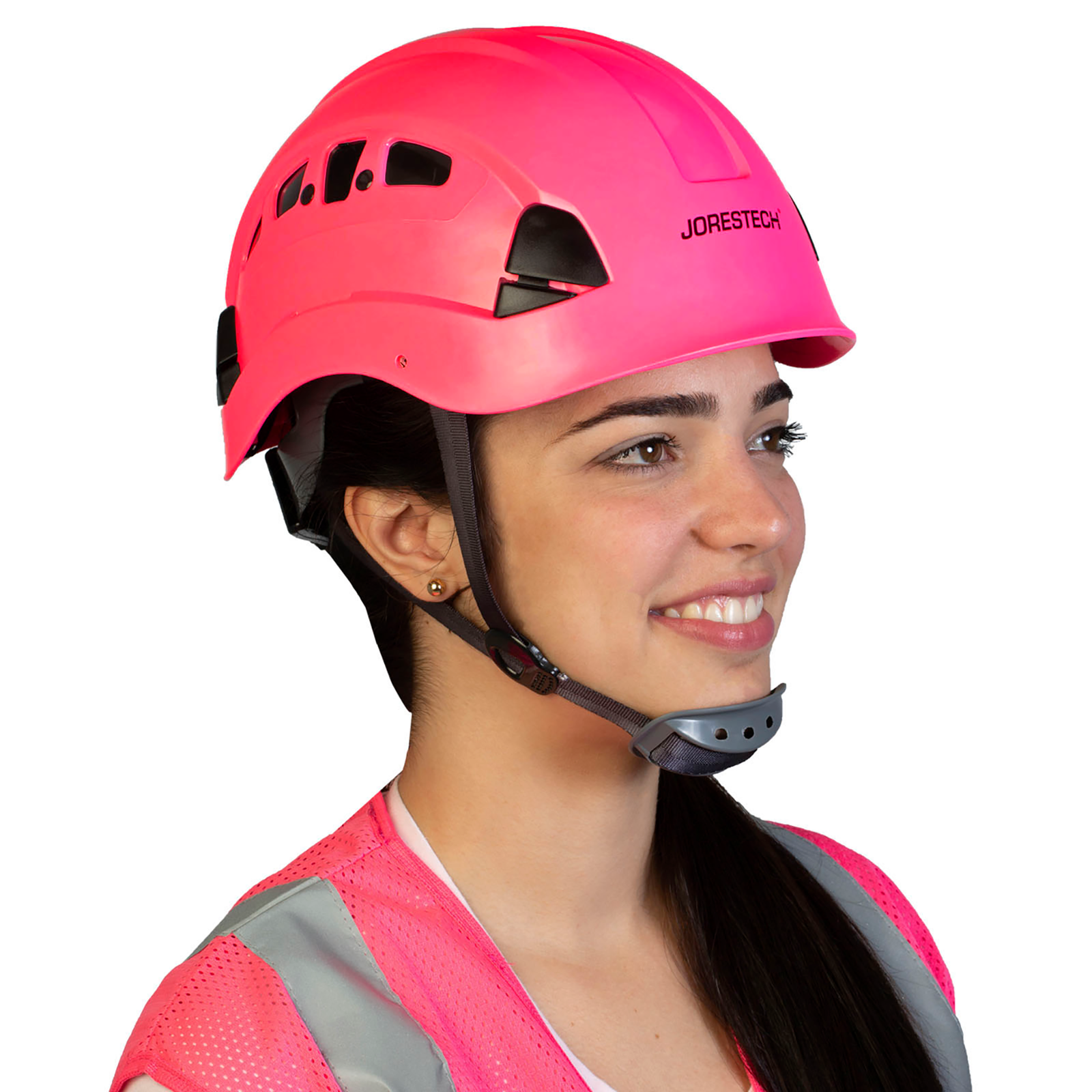 A woman wearing the Jorestech pink ventilated hard hat with adjustable 6 point suspension and chin strap