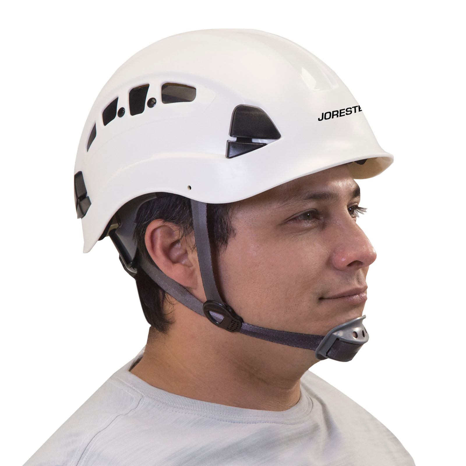 A man wearing the Jorestech white ventilated rescue ANSI hard hat with adjustable 6 point suspension and chin strap
