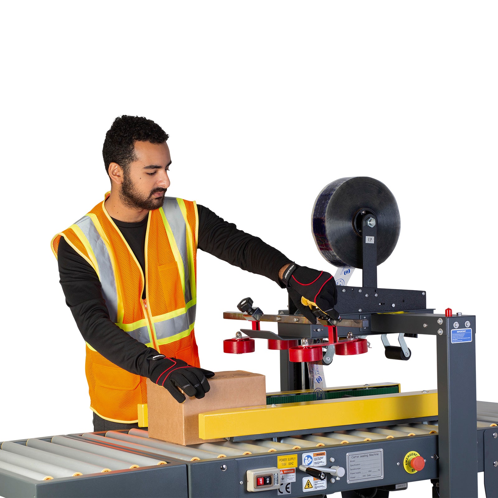 operator wearing orange safety inserting brown carton boxes into a case sealer machine with side traction