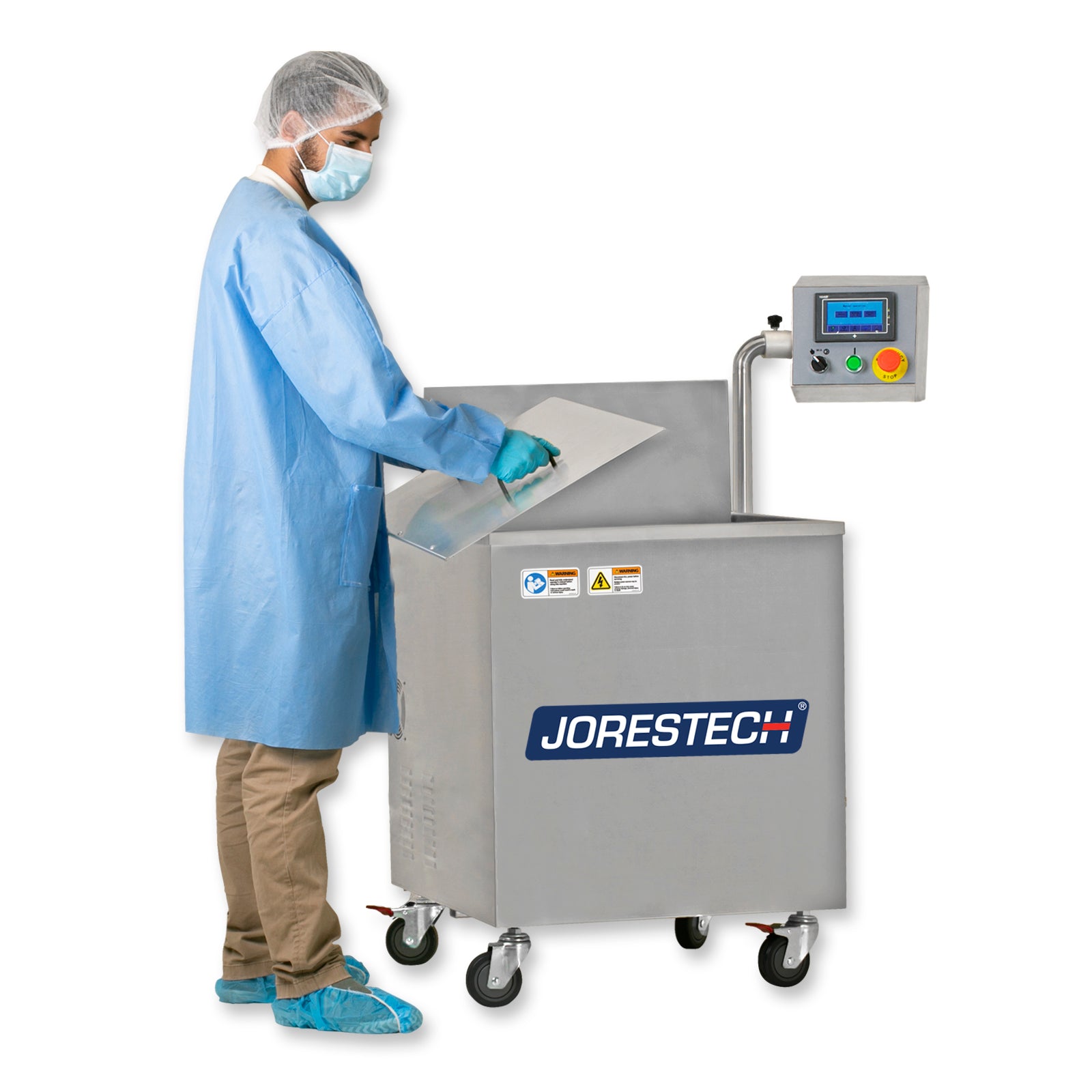 Person removing the lid that covers the JORES TECHNOLOGIES® semi-automatic dip style hot water shrink tank